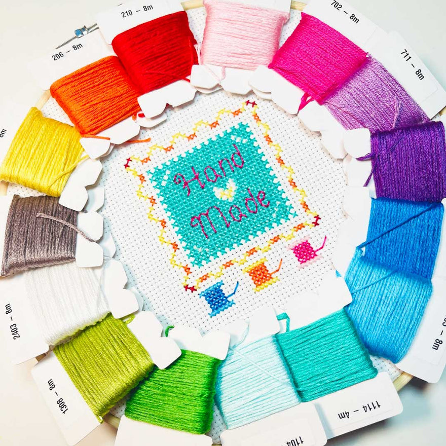 Hand made, our new cross stitch-a-long is a circular hoop design that fits perfectly in a 12-inch hoop. The little sneak peek pictured here, will sit perfectly at the centre of the design.