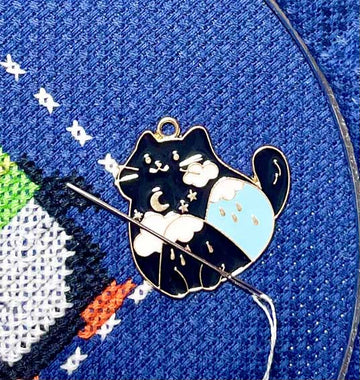 Cat needle minder