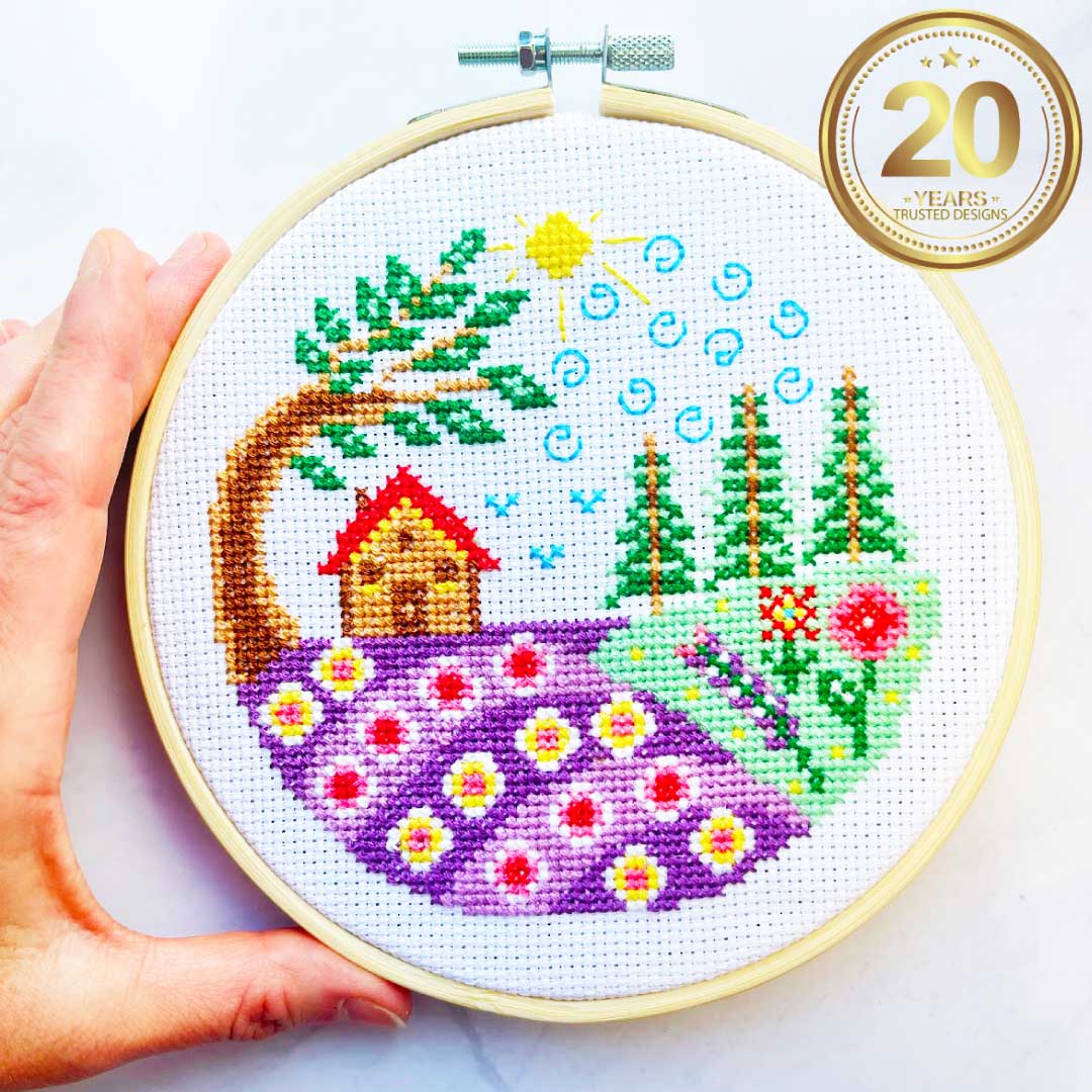 Seasonal Series Cottage Collection – Summer CottageSummer cottage is the first design in our Seasonal Cottage Collection — a series of cosy cross stitch hoop cottages to stitch and display through the year.Each cottage is first released as part of the subscription box, with a limited number of one-time boxes available.Start your collection with the Summer Cottage. 